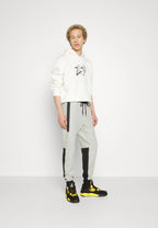 Calça Nike Tech Fleece Windrunner