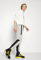 Calça Nike Tech Fleece Windrunner