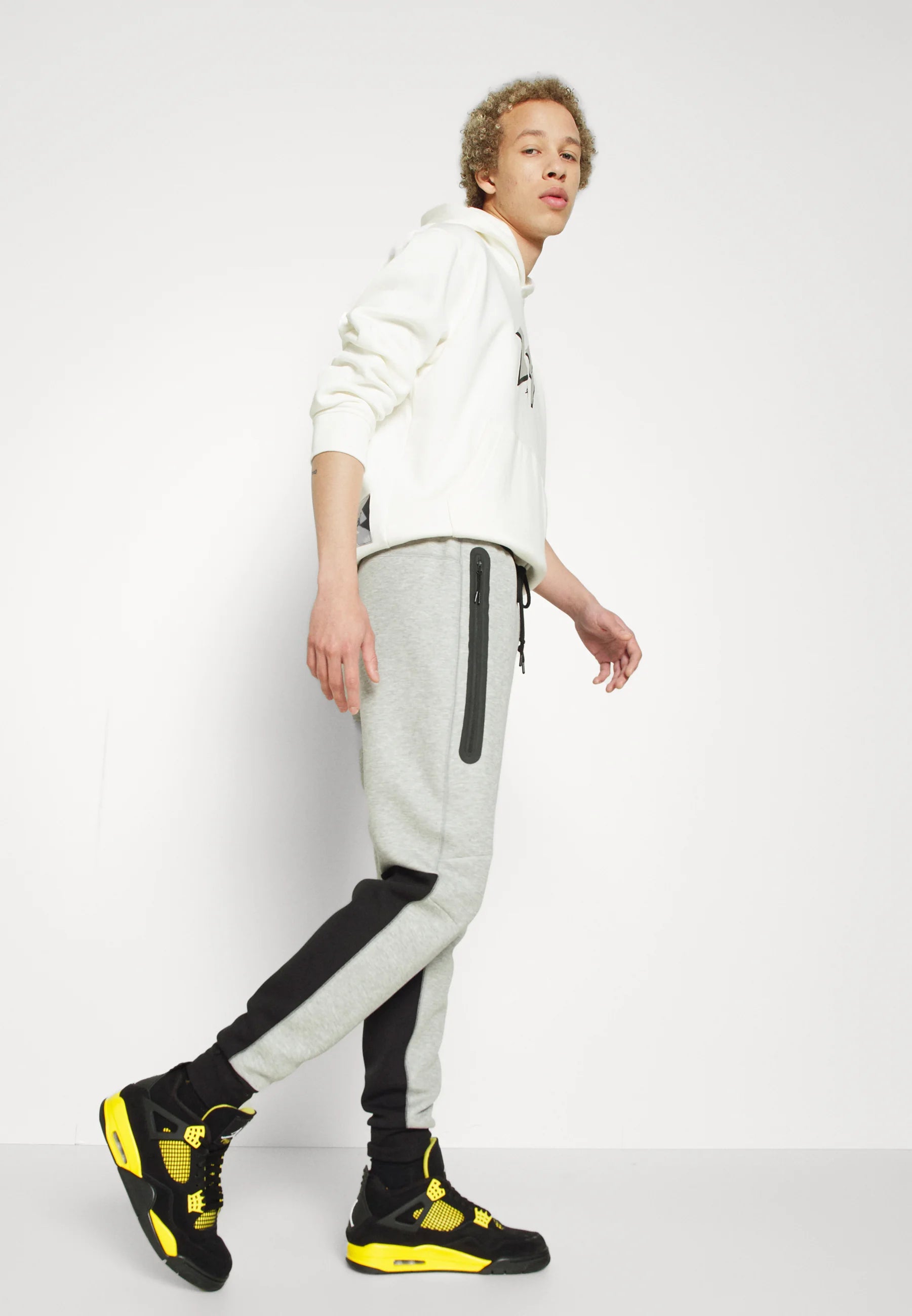 Calça Nike Tech Fleece Windrunner