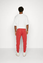 Calça Nike Tech Fleece Windrunner