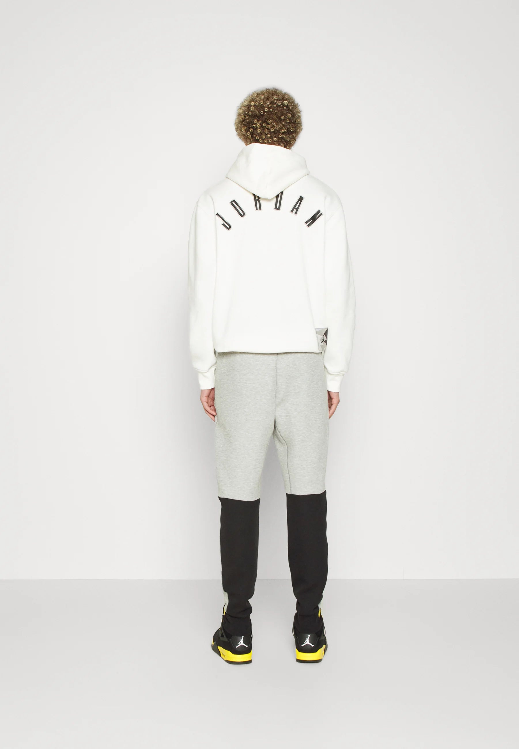 Calça Nike Tech Fleece Windrunner